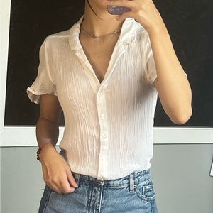 White button down blouse with fluted sleeves